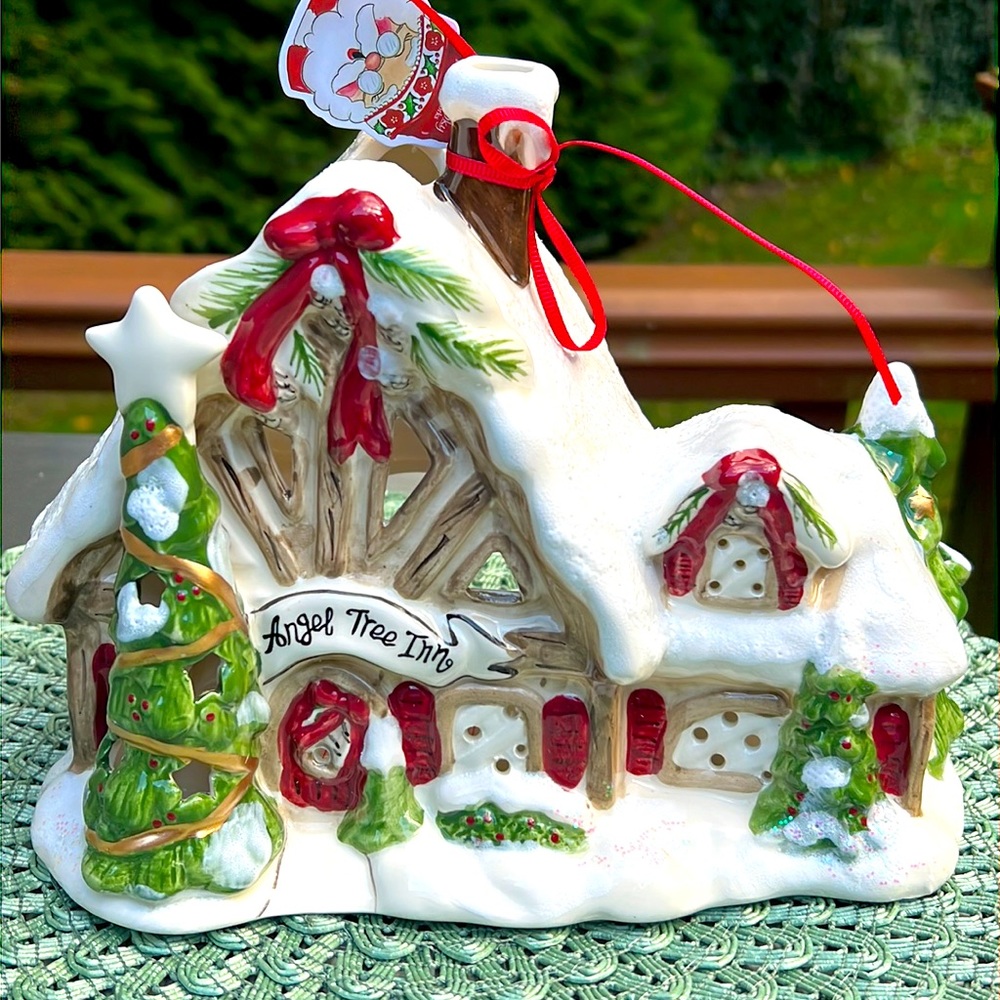 New, blue sky, clayworks angel tree inn candle house.